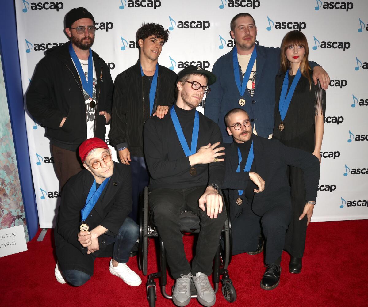 The members of Portugal. The Man at the 35th annual ASCAP Pop Music Awards.
