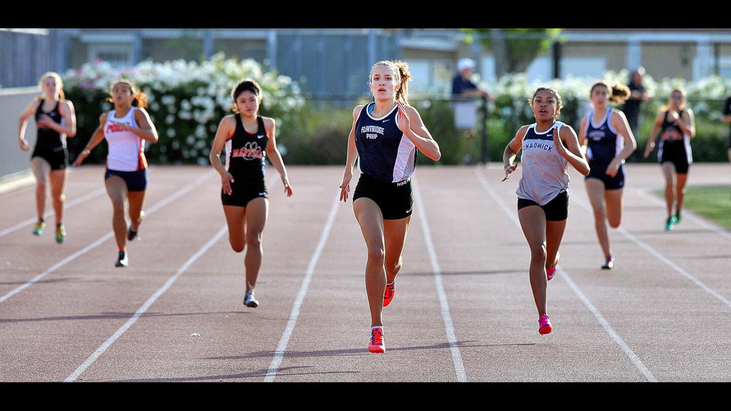 Flintridge Prep's Hanna Barakat runs to the finish to win the 400 meter in a Prep League track finals at Burroughs High School, on Friday, April 28, 2017.