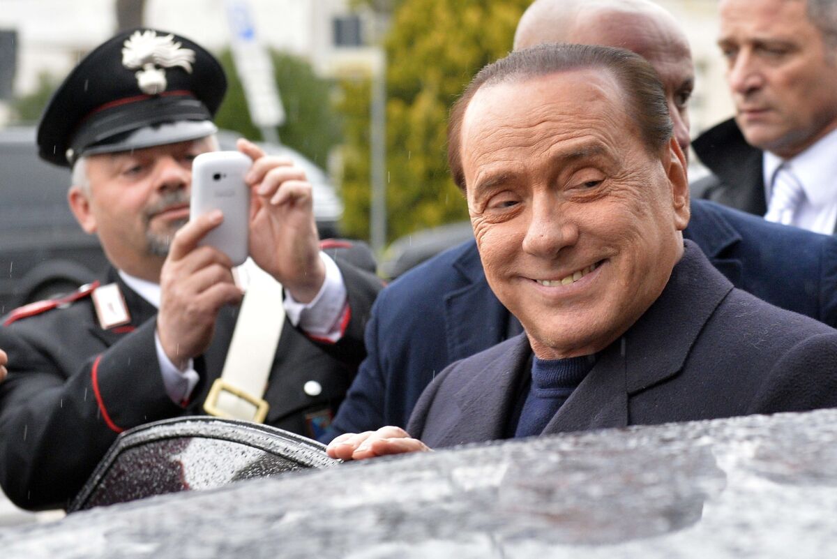 Former Italian Prime Minister Silvio Berlusconi at a Rome airport.
