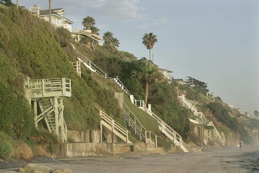 Surfers enjoy Leucadias tucked away beaches. Oceanfront development may change the areas funky ambience.