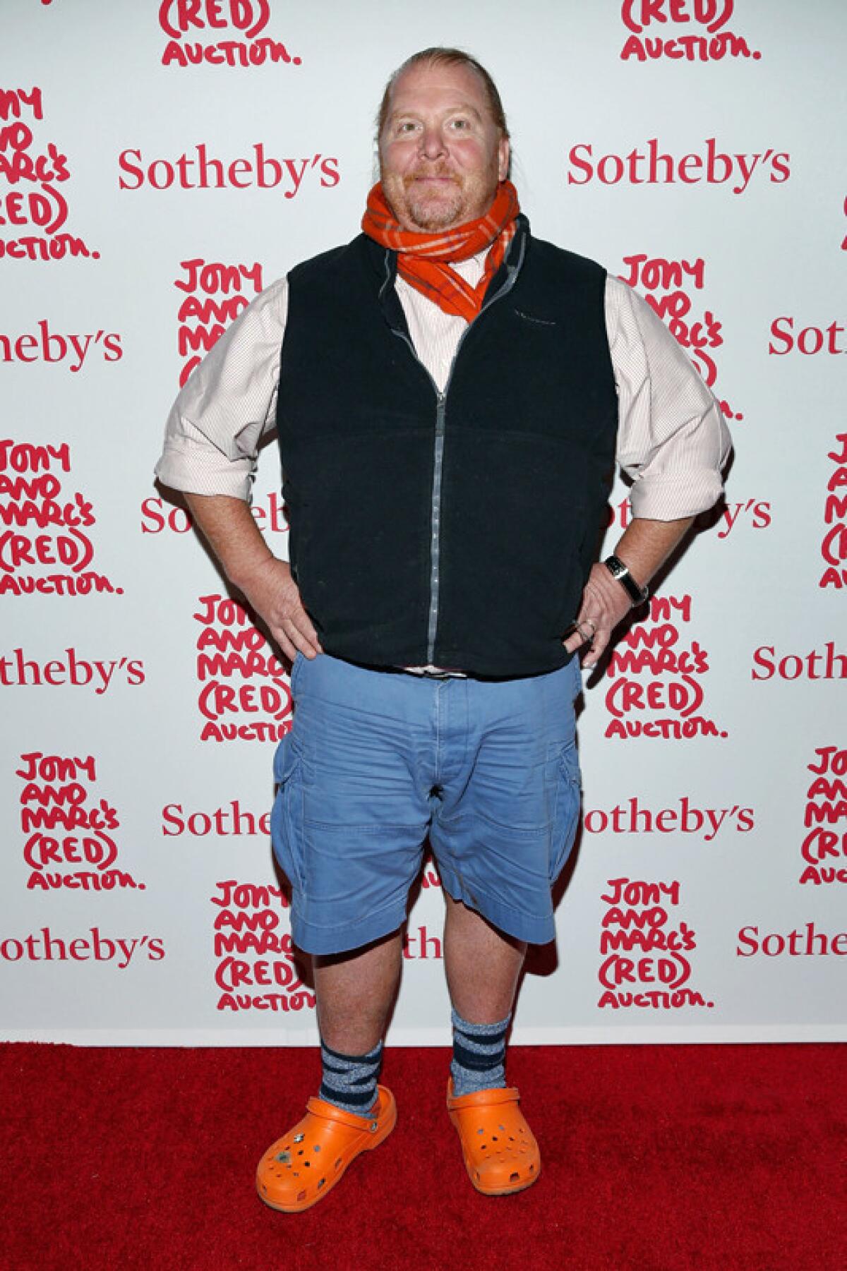 Chef Mario Batali, wearing his trademark orange Crocs, attends Jony and Marc's (RED) Auction at Sotheby's on Saturday in New York City.