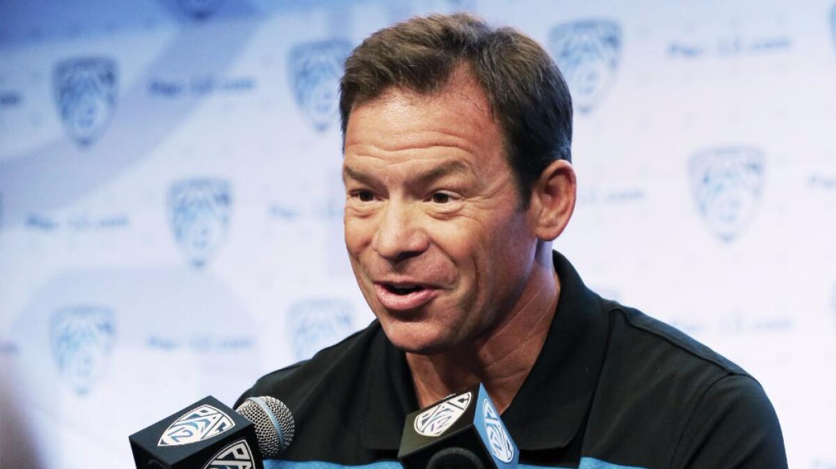 UCLA Coach Jim Mora answers questions during Pac-12 media day on July 15.