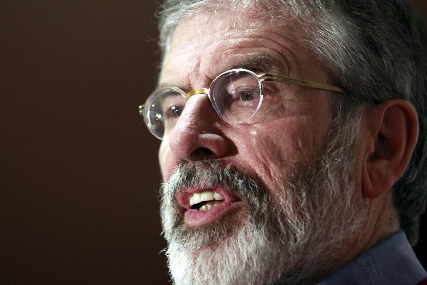 Sinn Fein President Gerry Adams speaks in Belfast, Northern Ireland, on Dec. 31, 2013. He was arrested Wednesday in the 1972 kidnapping and slaying of a Belfast widow by the Irish Republican Army.