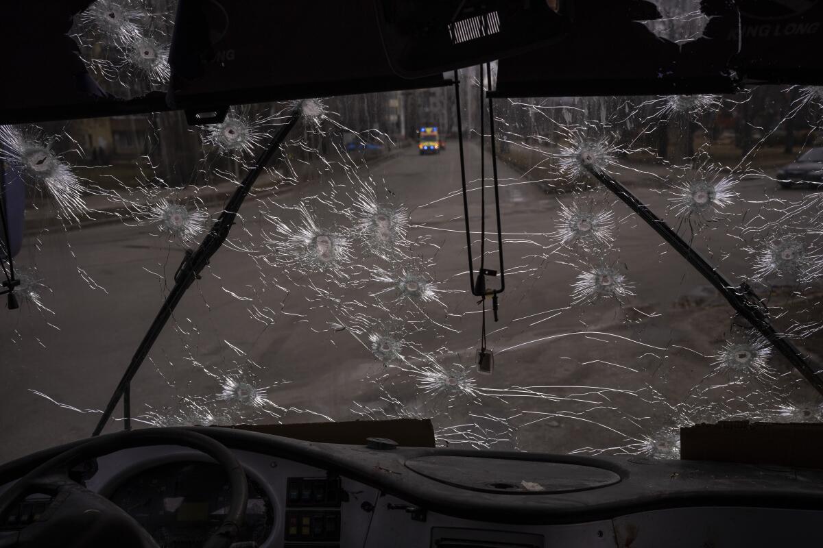 A machine-gunned bus where several people died in an ambush is photographed days after in the city of Kyiv, Ukraine, Friday, March 4, 2022. (AP Photo/Emilio Morenatti)