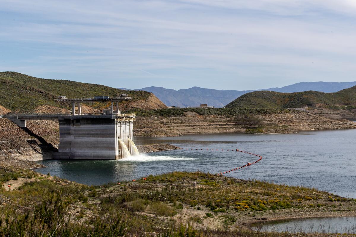 Water cascades into Diamond Valley Lake in Riverside County on March 27.