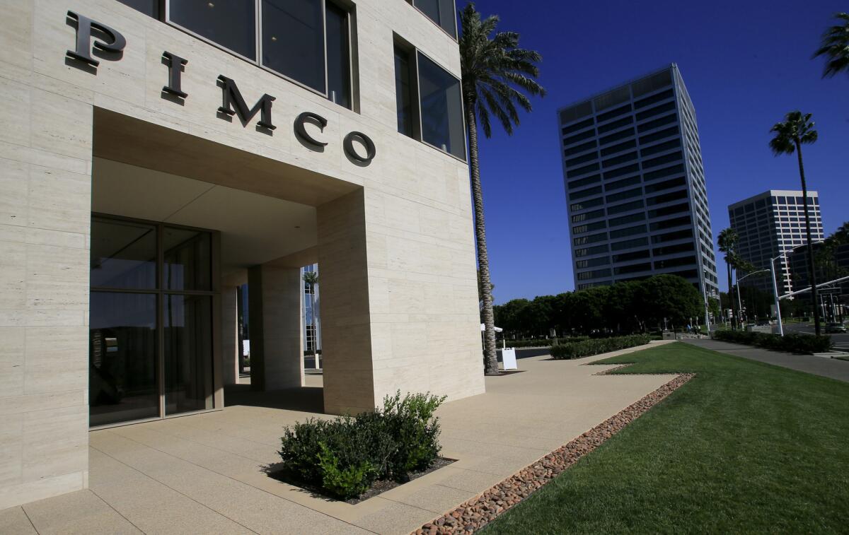 Pimco offices in Newport Beach. The mutual fund company said investors continued to pull money out of its flagship fund in the wake of star manager Bill Gross's departure last fall.