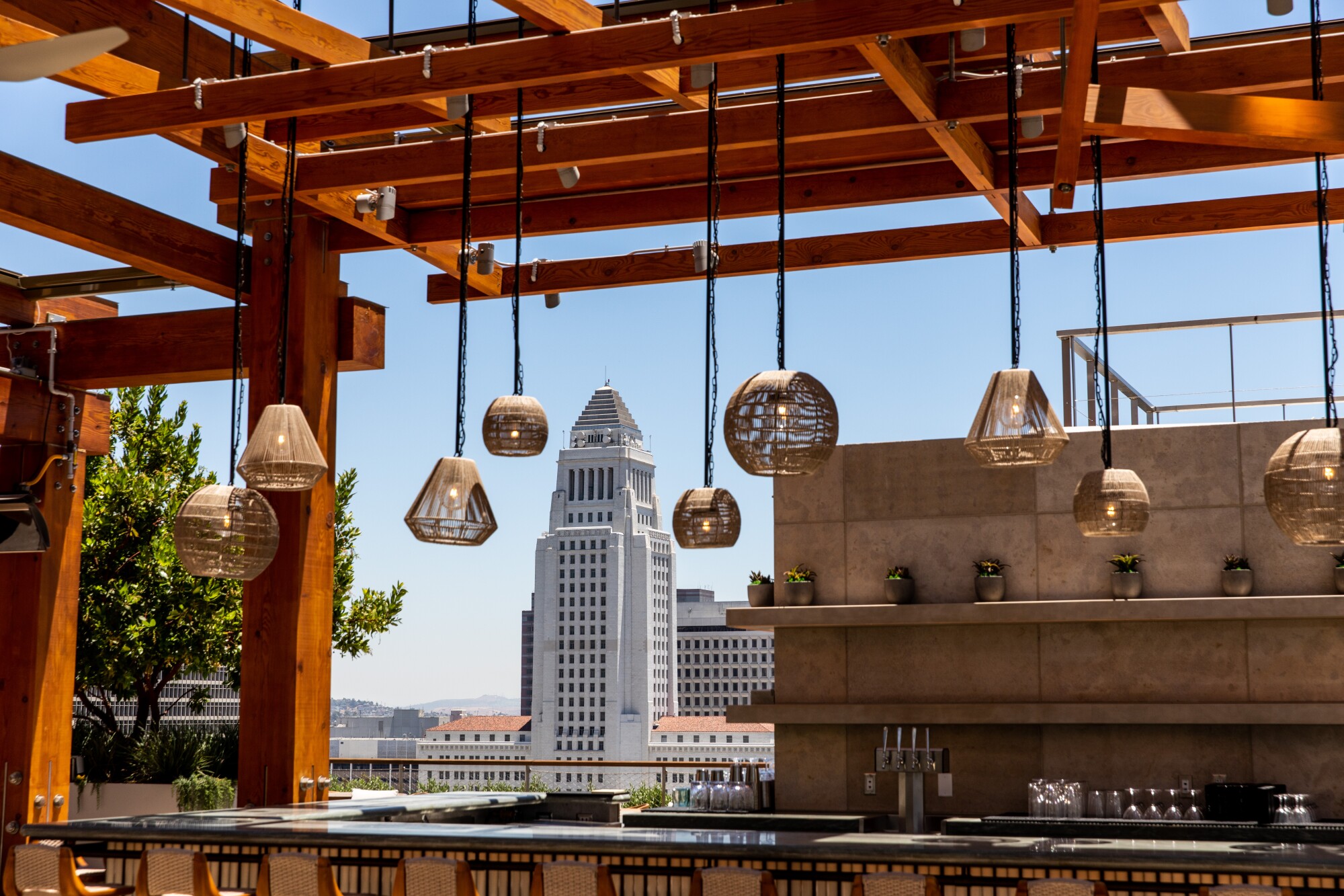 Los Angeles City Hall as seen from Airlight, a bar on the 10th floor of Conrad Los Angeles hotel.