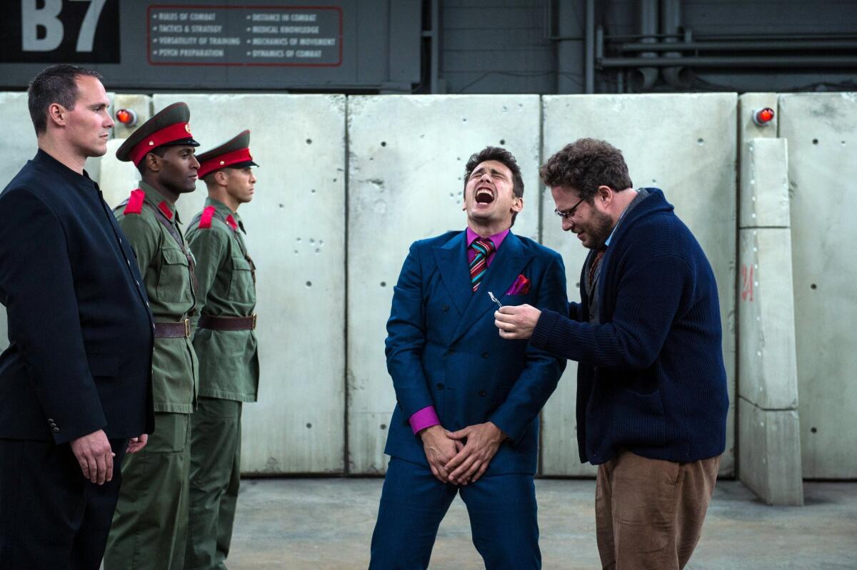 James Franco, center, and Seth Rogen, right, in "The Interview."