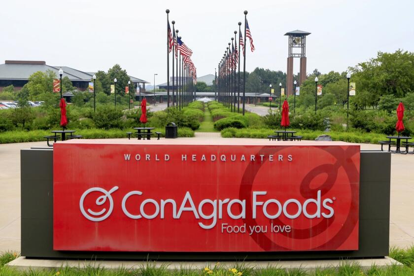 Flags fly over ConAgra Foods world headquarters in Omaha, Neb.
