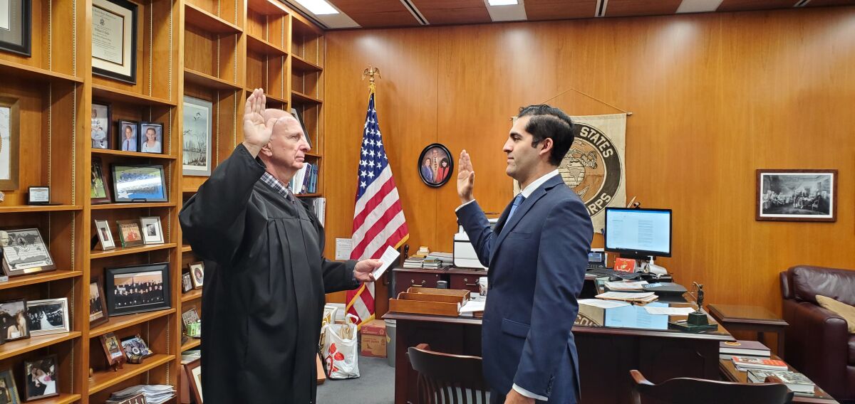 Noel Meza was sworn-in by Judge William Gallo.