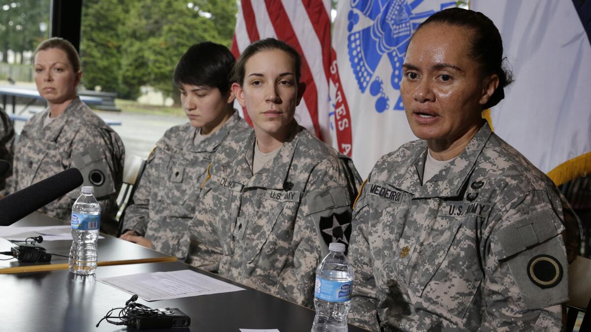 U.S. Army soldiers talk to reporters about the decision to allow women to be in front-line combat positions.