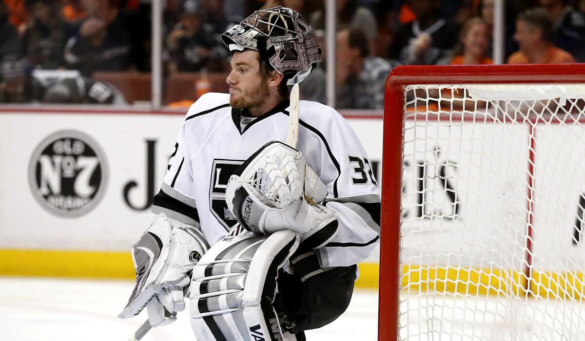 Kings goalie Jonathan Quick stretches during a break in a playoff game against the Ducks in last spring.