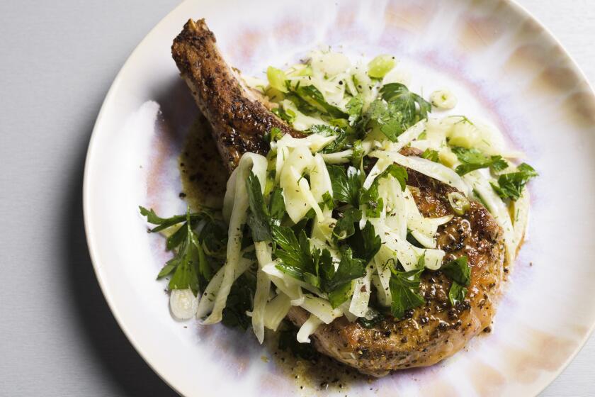Seared pork chops with a fennel and herb salad is ready in about a half-hour.