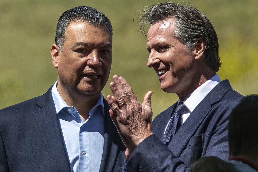 California Gov. Gavin Newsom, right, shown last year with Alex Padilla, the state’s first Latino U.S. senator, has made historic appointments, but his office needs a public system that will show whether all his appointees reflect the communities they are meant to serve.