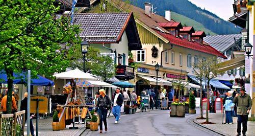 Cafes and souvenir shops line Oberammergau's main thoroughfare. The village has managed to retain its winsome charm amid commercialization.