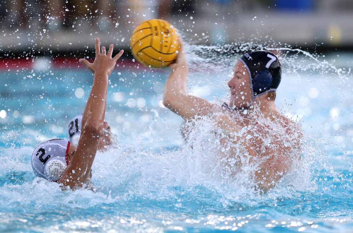 Newport Harbor's Finn LeSieur (7) fires in a goal during the semifinals of the CIF Southern Section Open Division playoffs.