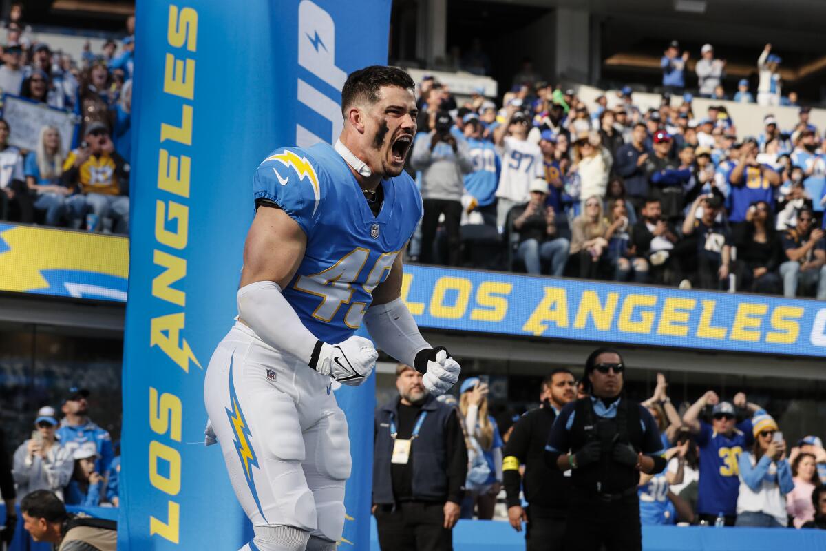 Chargers linebacker Drue Tranquill takes the field before a win over the Rams on Jan. 1.