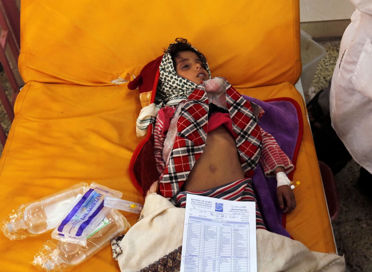 A Yemeni girl receives treatment amid a cholera outbreak at a hospital in Sana, Yemen, in September 2017.