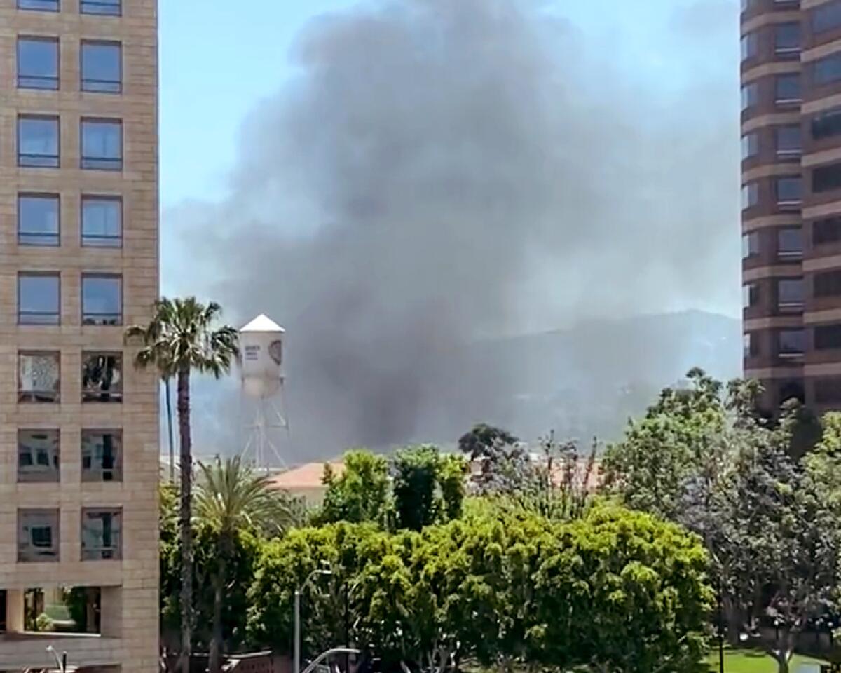 View of smoke rising from the Warner Bros. Studios in Burbank