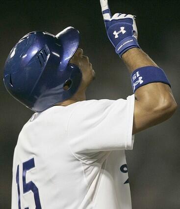 Dodgers Rafael Furcal points skyward after his single sent in the tieing run in the sixth inning.