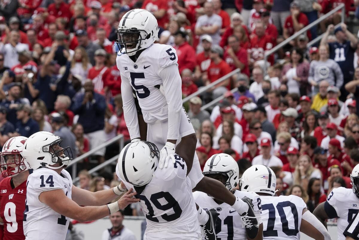 Penn State's Jahan Dotson celebrates his touchdwon catch during the second half of an NCAA college football game against Wisconsin Saturday, Sept. 4, 2021, in Madison, Wis. Penn State won 16-10. (AP Photo/Morry Gash)