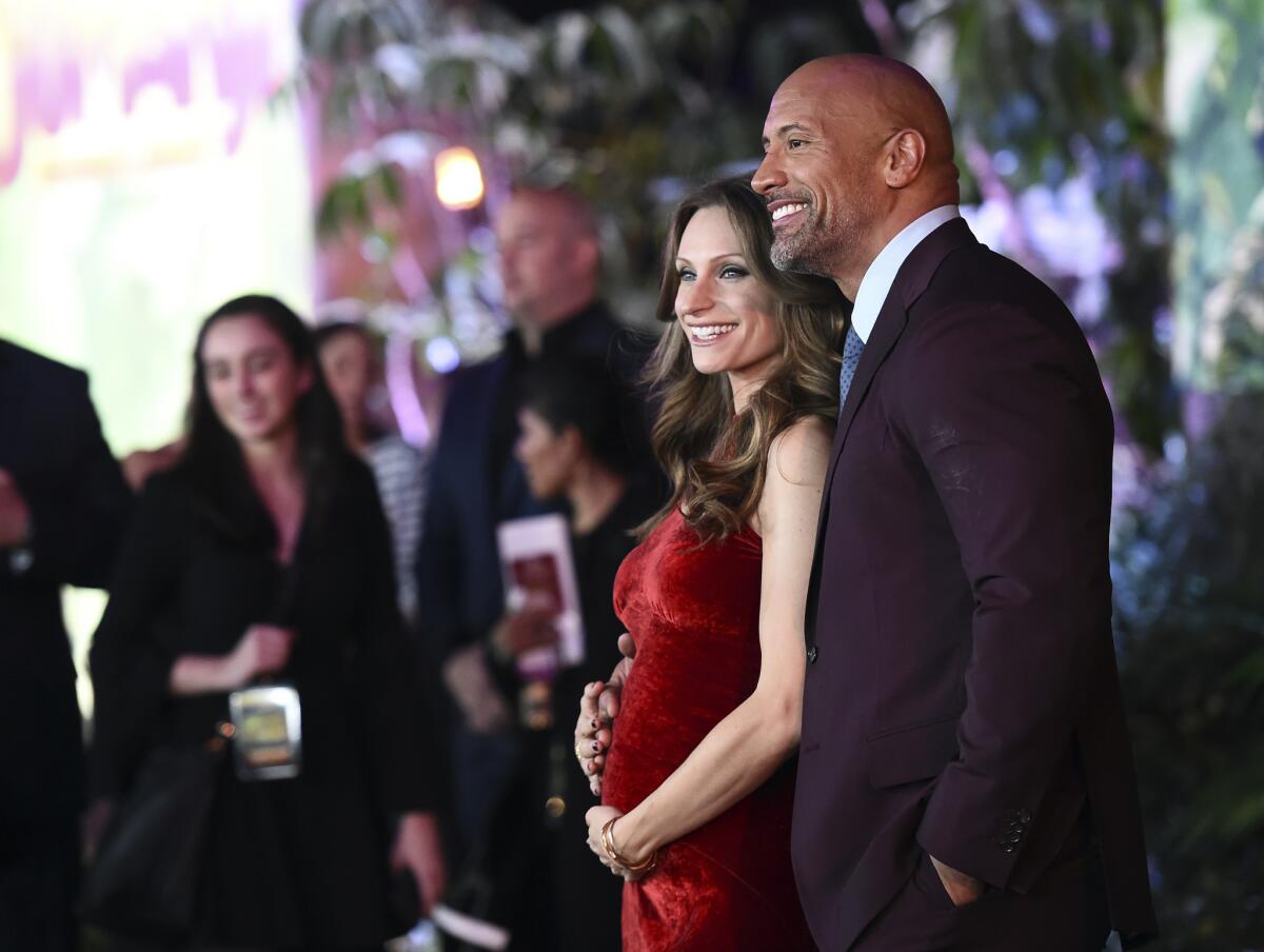Dwayne Johnson and Lauren Hashian at the Los Angeles premiere of "Jumanji: Welcome to the Jungle" on Monday.