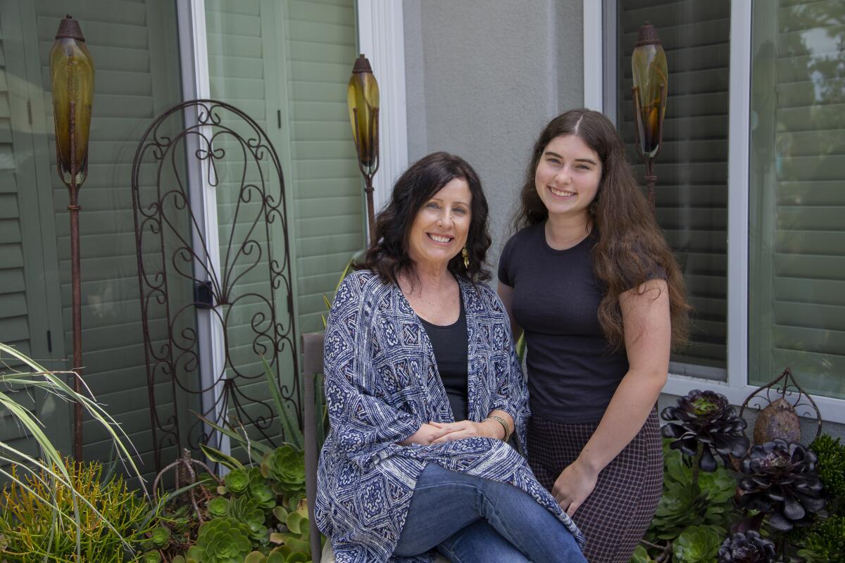 Therese Allison  poses with her daughter, Tori Hagan, who will be a sophomore at Huntington Beach High School.