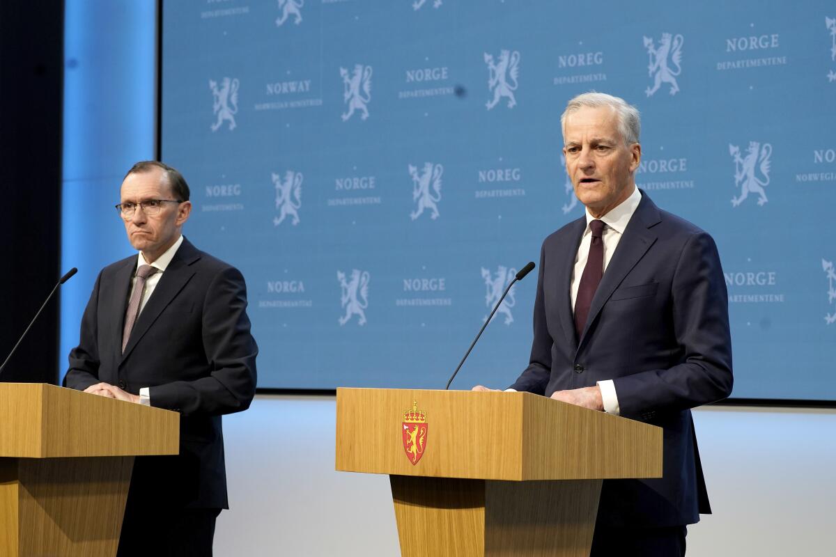 Norway's Prime Minister Jonas Gahr Store, right, with Foreign Minister Espen Barth Eide, speaks during a news conference.
