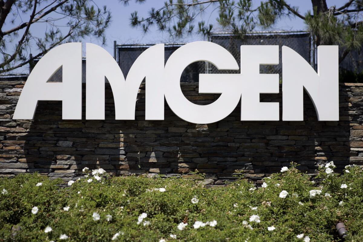 Amgen, the world's biggest biotech drugmaker, is buying one company and partnering with another to create new drugs.