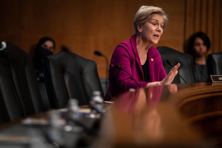 WASHINGTON, DC - FEBRUARY 14: Sen. Elizabeth Warren (D-MA) speaks to witnesses during a Senate Banking, Housing, and Urban Affairs hearing to examine the crypto crash, focusing on why financial system safeguards are needed for digital assets on Capitol Hill on Tuesday, Feb. 14, 2023 in Washington, DC. (Kent Nishimura / Los Angeles Times)