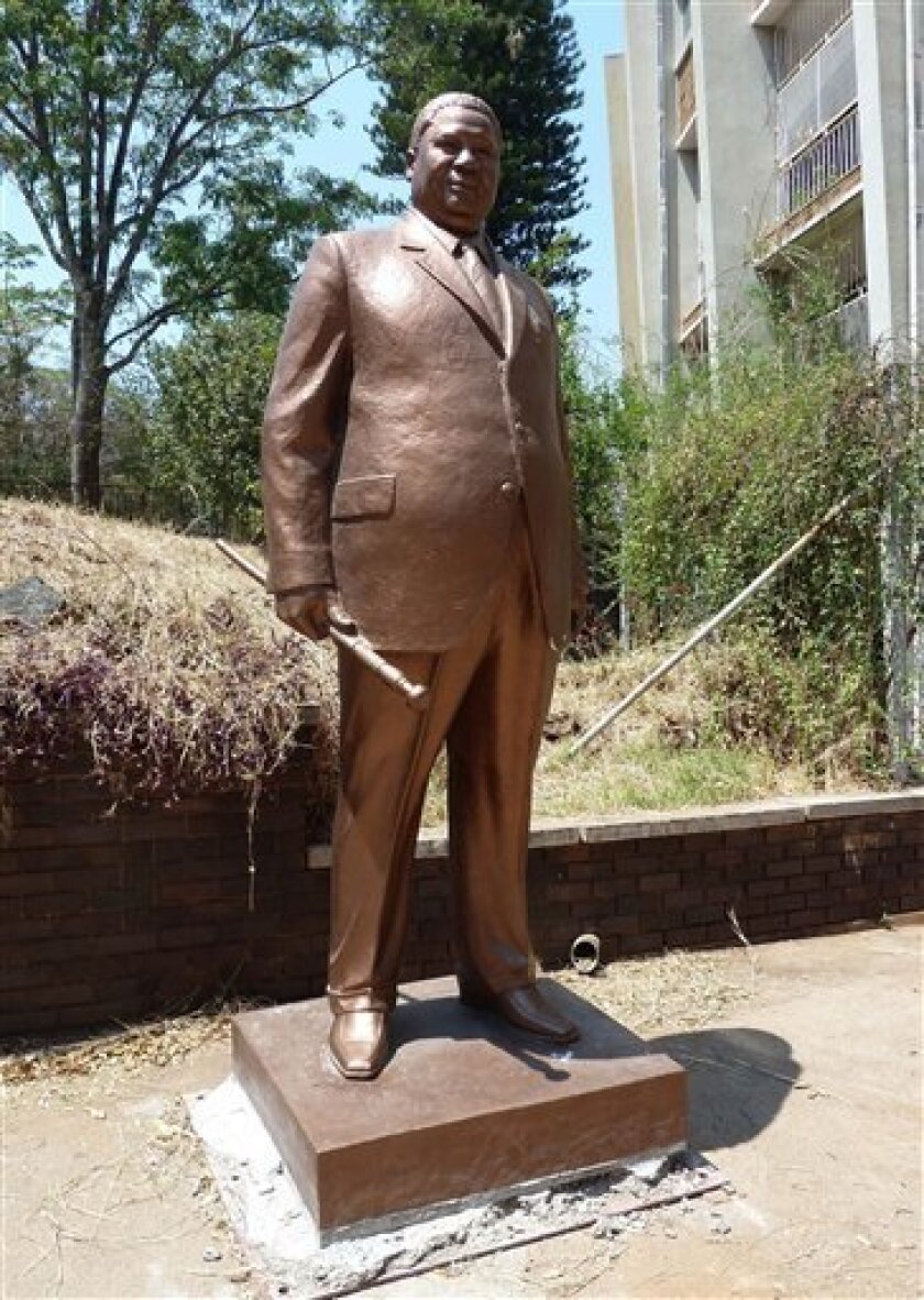 In this photo taken Friday Sept 21, 2010 a statue of Joshua Nkoma in the grounds of the Museum in Bulawayo, Zimbabwe. Nkoma, a former guerilla leader known as "Father Zimbabwe" died in 1999 at the age of 82. (AP Photo)