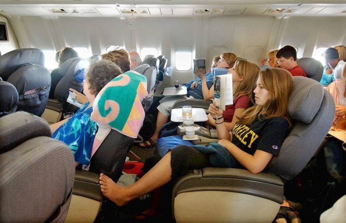 Business-class passengers on a United flight to Hawaii.