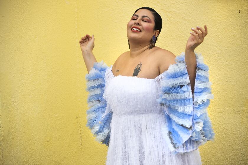 HIGHLAND PARK, CA-APRIL 13, 2020: Musician San Cha is photographed at her home in Highland Park. Her music is dramatic and often explosive, weaving storytelling into the cumbia, punk and Latin rhythms that inspire her work. (Mel Melcon/Los Angeles Times)