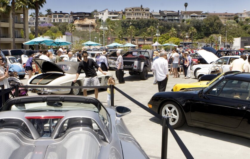 The car show crowd at the Balboa Bay Club's annual Father's Day event during a previous year.