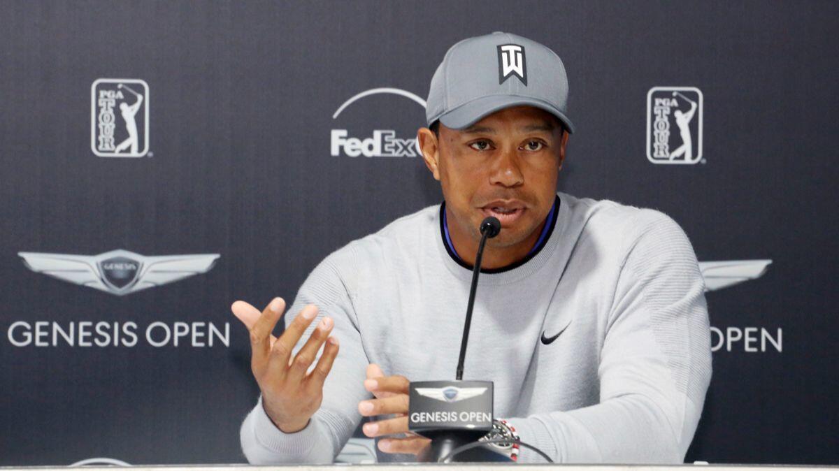 Tiger Woods talks about his charitable works off the course and his return to competitive golf in the Genesis Open at Riviera Country Club after an absence of 12 years on Tuesday.