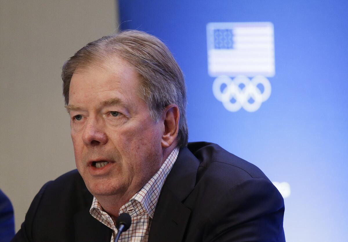 U.S. Olympic Comittee Chairman Larry Probst speaks during a news conference on June 30, in Redwood City, Calif.