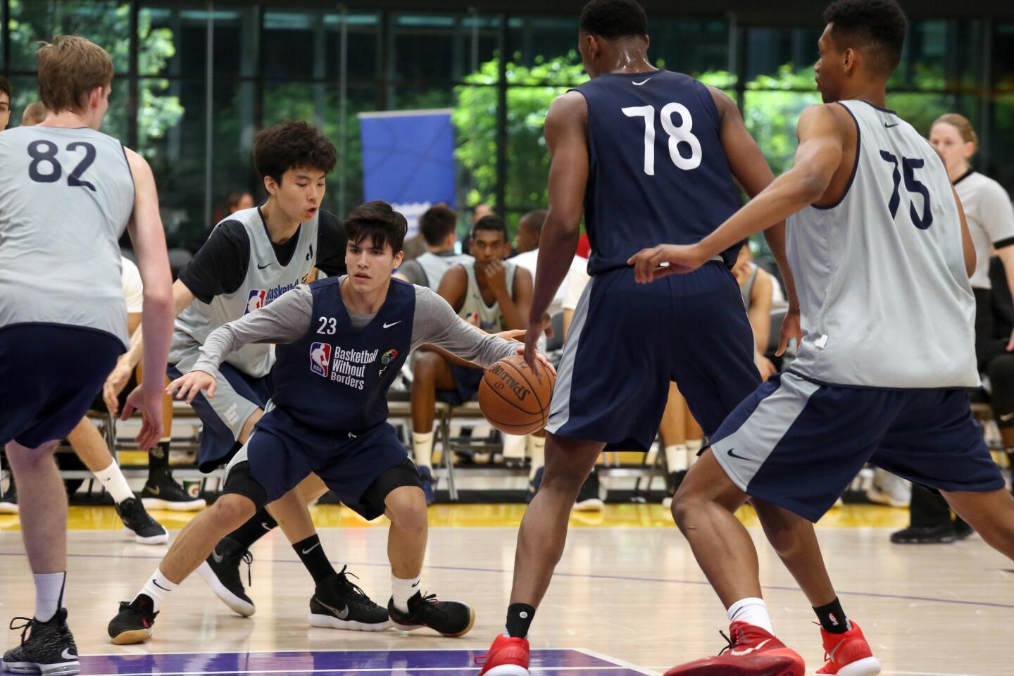 Carlos Paez of Venezuela drives down the lane during a scrimmage at the Basketball Without Borders global camp.