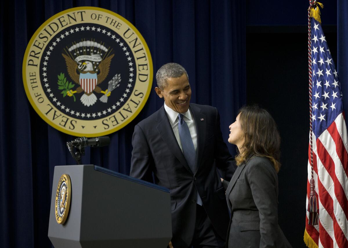 President Obama greets Julie Chavez Rodriguez before the screening of a new movie about her grandfather, Cesar Chavez, at the White House complex.