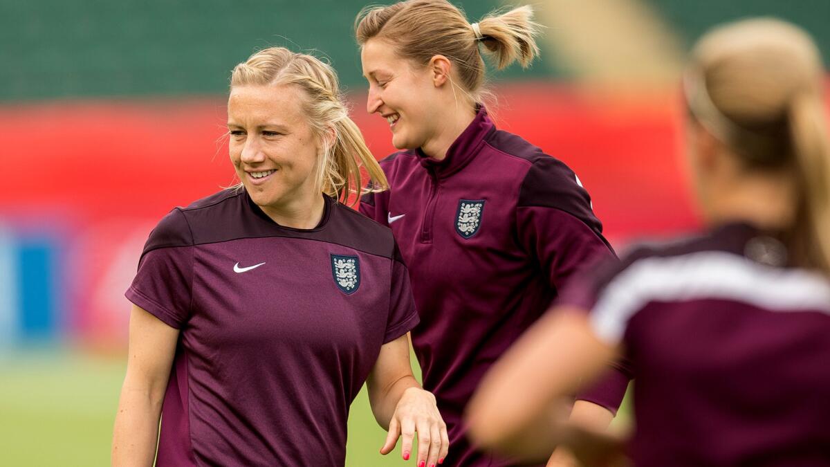 Defender Laura Bassett, left, and England will take on top-ranked Germany in the third-place game of the Women's World Cup on Saturday.
