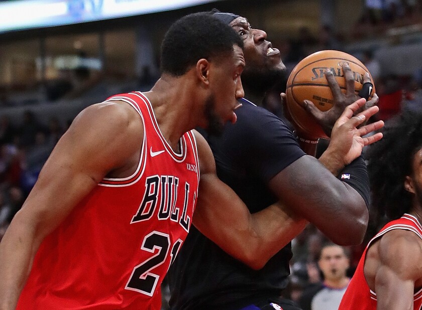 The Clippers' Montrezl Harrell is fouled by the Bulls' Thaddeus Young on Dec. 14, 2019.