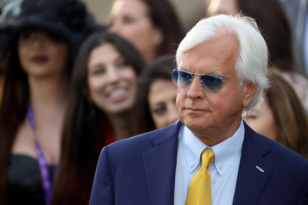 Trainer Bob Baffert looks on from a winner's circle at the 2021 Breeders' Cup.