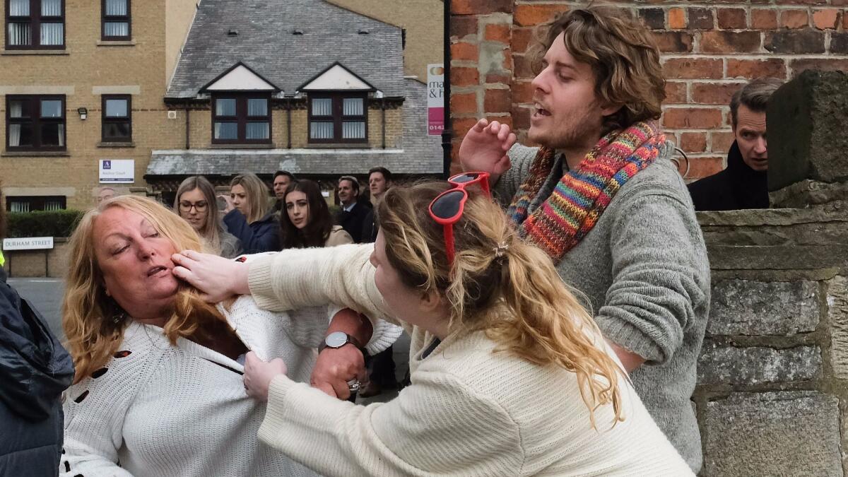 A UK Independence Party supporter, left, scuffles with a pro-European Union supporter ahead of a visit by UKIP leader Paul Nuttall to Hartlepool, England, on April 29, 2017.
