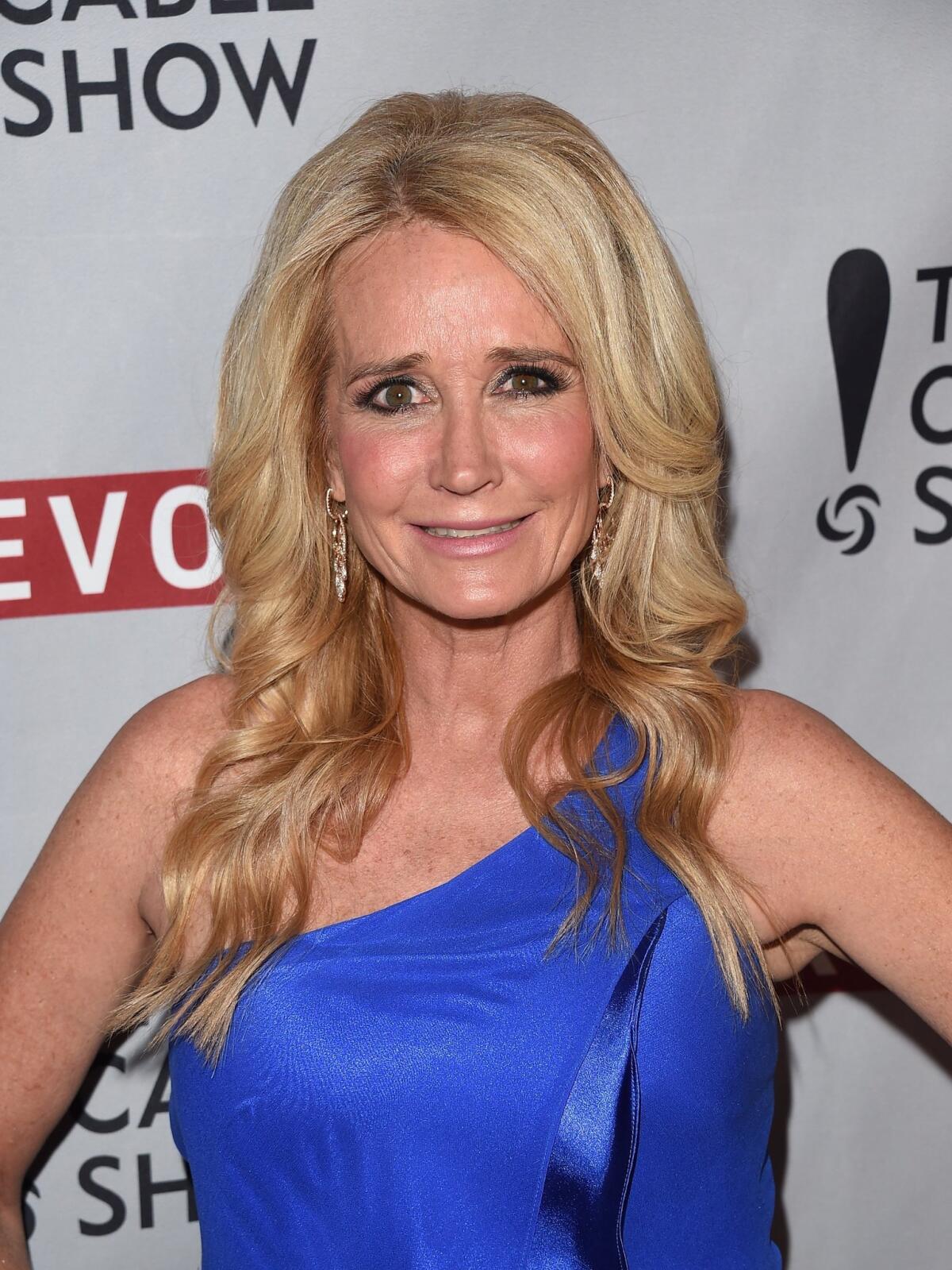 TV personality Kim Richards was arrested April 16 at the Beverly Hills Hotel on suspicion of public drunkenness. She also faces charges of resisting arrest and battery on a police officer.