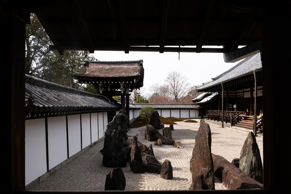 A view of the southern garden at Tofuku-ji, which terminates at the far end with five mossy mounds.