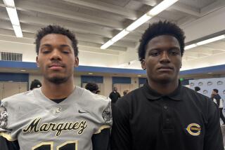 Junior linebackers Elyjah Staples (left) of Marquez and De'Andre Kirkpatrick of Crenshaw.