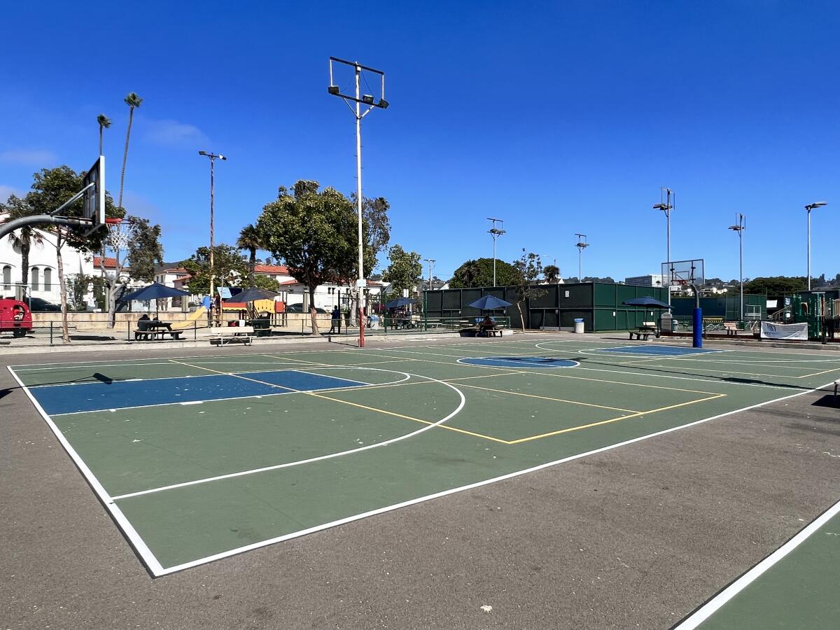 The east basketball court at the La Jolla Recreation Center is striped with pickleball lines.
