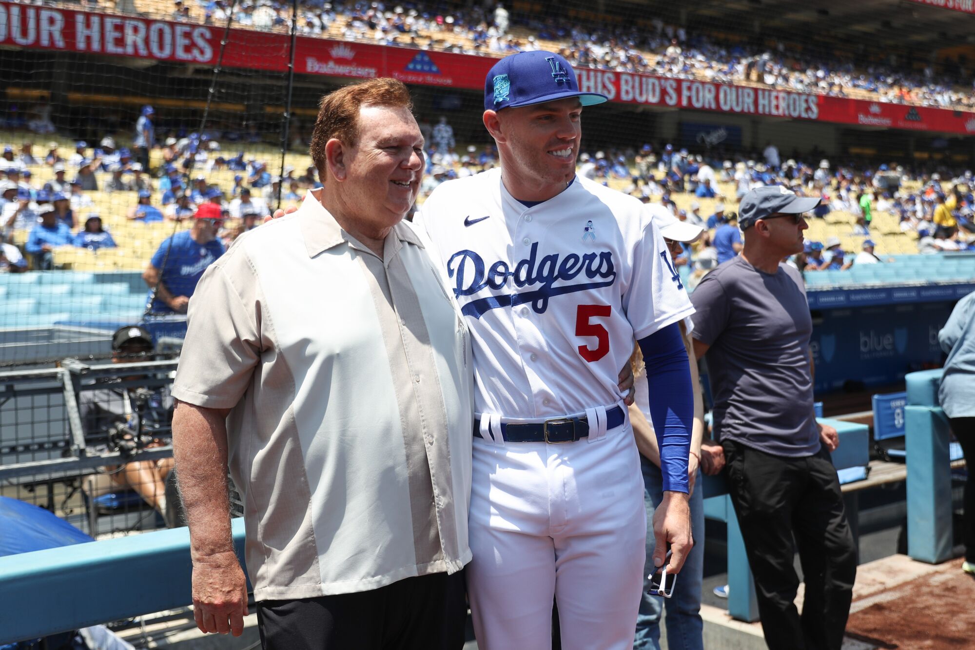 Freddie Freeman of the Los Angeles Dodgers poses for a photo with his father, Fred, on June 18, 2023.