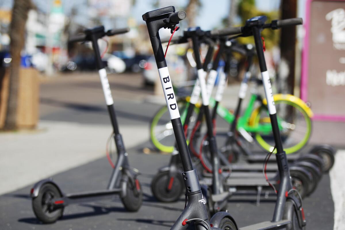 Bird electric scooters line Garnett Ave. in Pacific Beach on March 6, 2018.