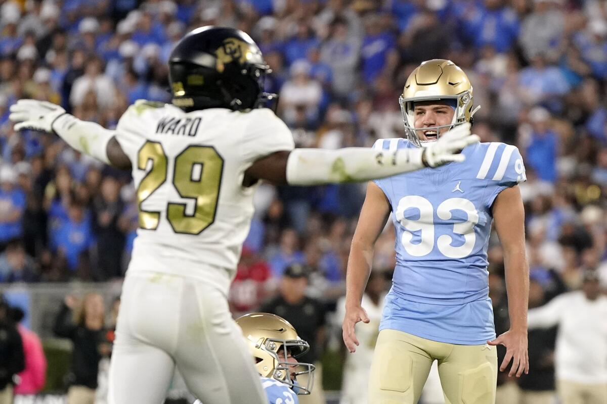 Colorado safety Rodrick Ward holds his arms out at his sides after UCLA kicker R.J. Lopez missed a field goal.