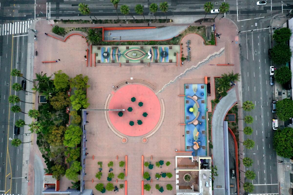 Aerial view of Pershing Square in downtown L.A., with a mostly concrete plaza